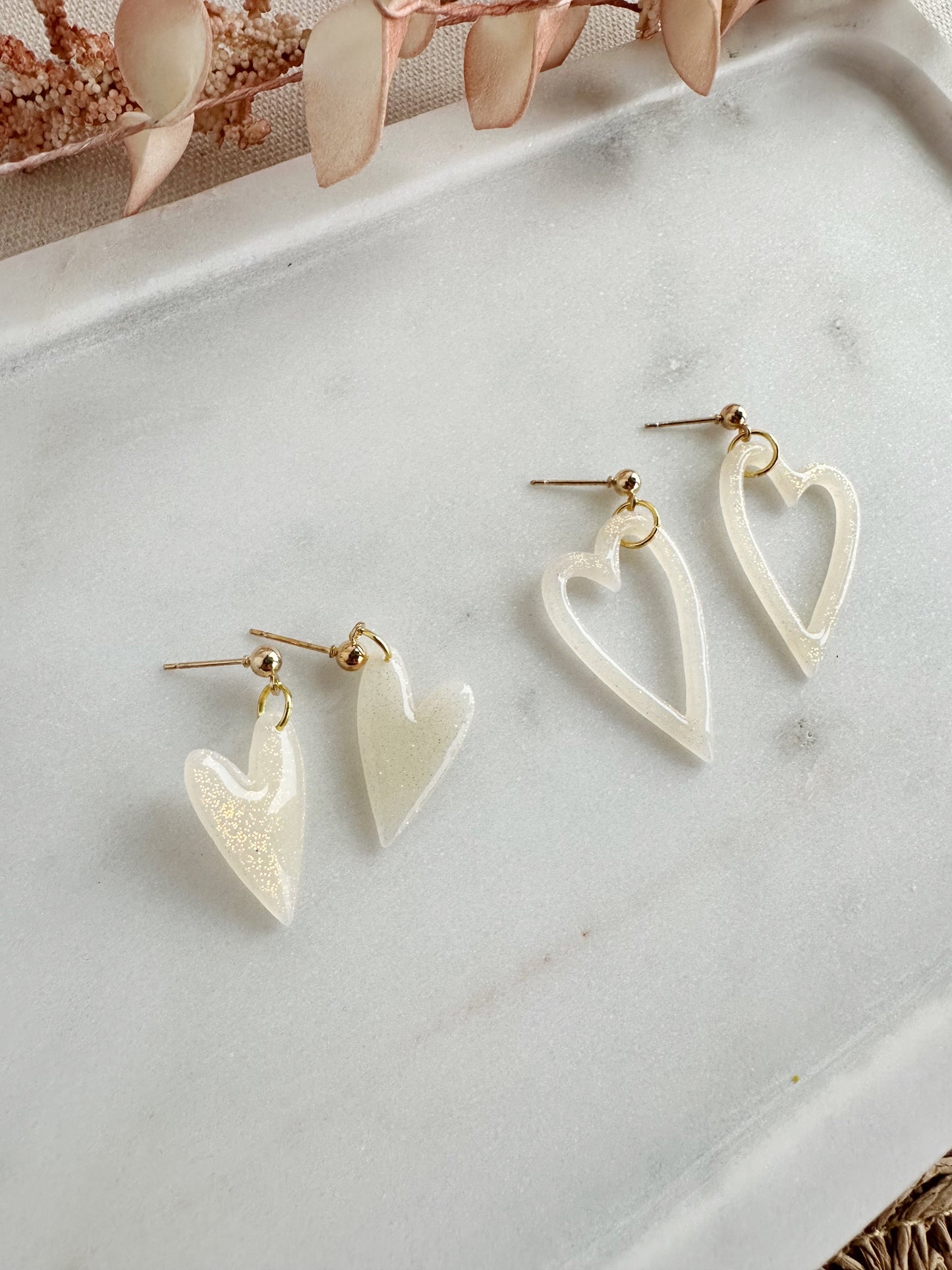Holographic Heart Dangles